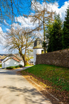 Wallerode in Belgium street view with a tower of the Castle Wallerode