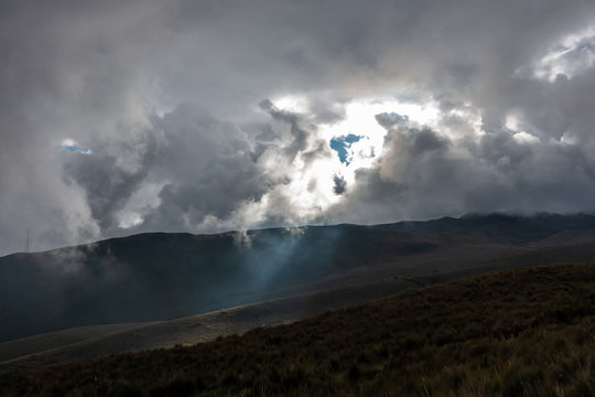 Sun Behind Dark Clouds