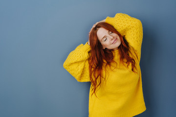 Blissful young woman enjoying a quiet moment