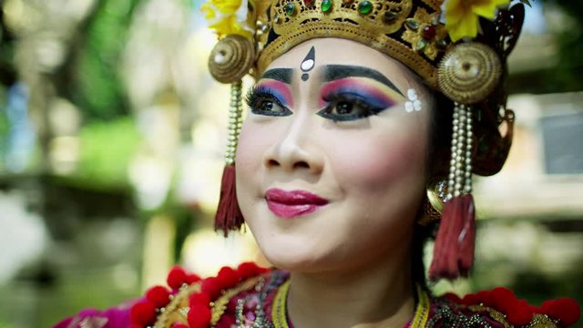 Indonesian female performing cultural traditional dance Ubud Bali