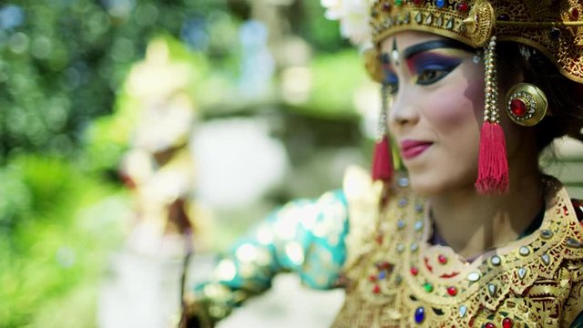 Balinese female wearing traditional clothing ancient dance Indonesia
