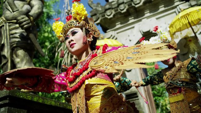 Balinese artistic females performing ancient spiritual dance Indonesia