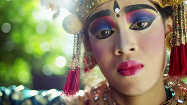 Portrait of young Indonesian female Balinese spiritual dancer 