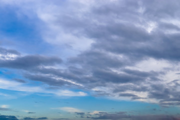Beautiful white and grey clouds and cloud formations on a deep blue sky