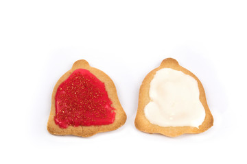 colorful icing on home made Christmas shaped cookies isolated on white