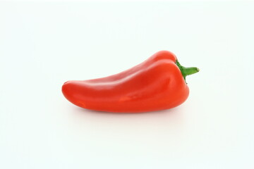 Fresh vegetables - red sweet pepper on white background - healthy food