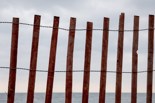 a snow fench on a windy beach to control sand drift