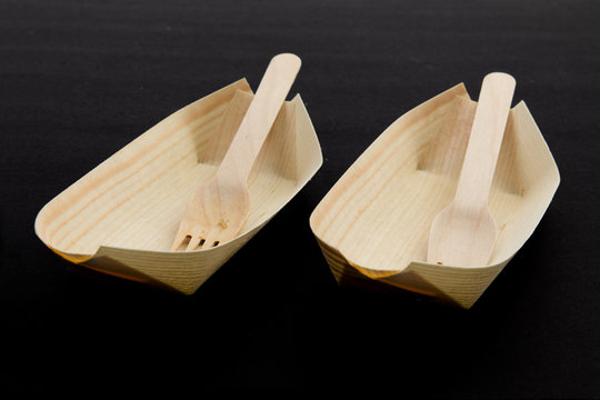 Sustainable Compostable Bamboo Disposable Bowls And Forks With Various Food Items  Isolated