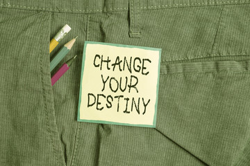 Text sign showing Change Your Destiny. Business photo showcasing Rewriting Aiming Improving Start a Different Future Writing equipment and green note paper inside pocket of man work trousers