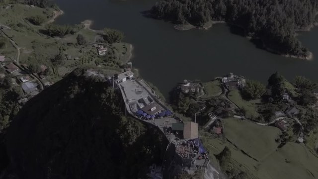 View of the Stone, the Guatap&eacute; Pe&ntilde;ol and the Slopes of the Small Hills that Surround it that look like Islands - Shot in V-Log