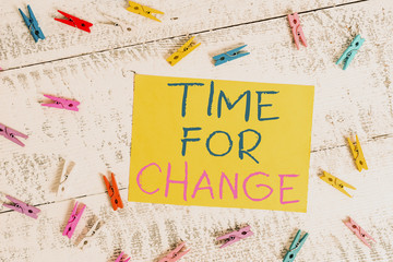 Conceptual hand writing showing Time For Change. Concept meaning Changing Moment Evolution New Beginnings Chance to Grow Colored clothespin rectangle shaped paper blue background