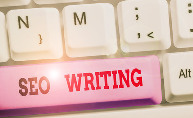Writing note showing Seo Writing. Business concept for grabbing the attention of the search engines...