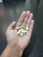 pills in hand