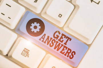 Handwriting text writing Get Answers. Conceptual photo to get a reply or something when asks a question to someone