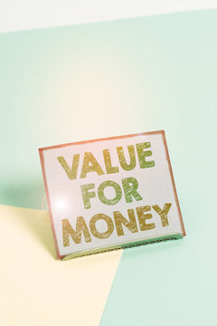Word writing text Value For Money. Business photo showcasing reference to something is well worth the money spent on it Paper placed tilted above buffer wire on soft pastel multi colours backdrop