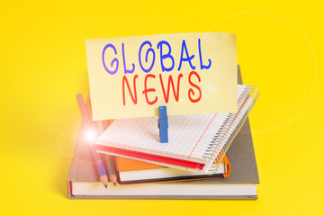 Conceptual hand writing showing Global News. Concept meaning world noteworthy information about...