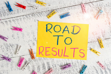 Conceptual hand writing showing Road To Results. Concept meaning Business direction Path Result Achievements Goals Progress Colored clothespin rectangle shaped paper blue background