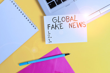 Conceptual hand writing showing Global Fake News. Concept meaning False information Journalism Lies...