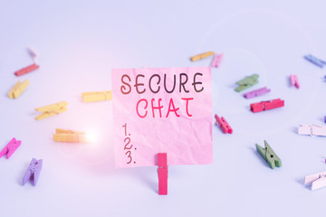 Handwriting text Secure Chat. Conceptual photo approach to protect messages when sent beyond the corporate Colored clothespin rectangle square shaped paper light blue background