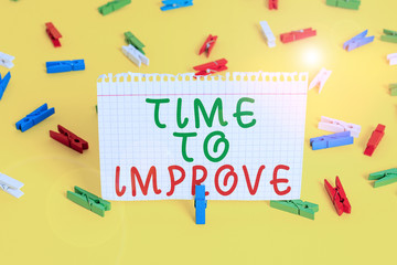 Handwriting text Time To Improve. Conceptual photo telling someone to develop himself Study hard Courses Colored clothespin papers empty reminder yellow floor background office