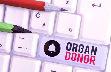 Conceptual hand writing showing Organ Donor. Concept meaning the act of donating an organ to a...