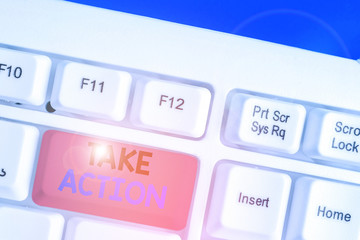 Conceptual hand writing showing Take Action. Concept meaning to do something To act in order to get...