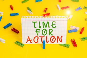 Handwriting text Time For Action. Conceptual photo getting ready to start doing encouragement Go fast Colored clothespin papers empty reminder yellow floor background office