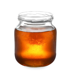 Jar with organic honey isolated on white