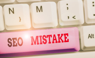 Writing note showing Seo Mistake. Business concept for action or judgment that is misguided or...