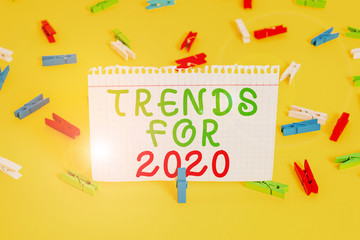 Handwriting text Trends For 2020. Conceptual photo list of things that got popular very quickly in this year Colored clothespin papers empty reminder yellow floor background office