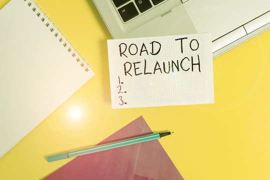Conceptual hand writing showing Road To Relaunch. Concept meaning In the way to launch again Fresh new start Beginning Laptop marker square sheet spiral notebook color background