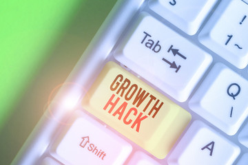 Writing note showing Growth Hack. Business concept for generally to acquire as analysisy users or customers as possible