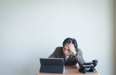 Aฺsian business man in room and action stance with copy space.