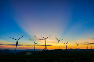 Obraz premium Wind turbine farm from clean energy. Wind power for electricity.