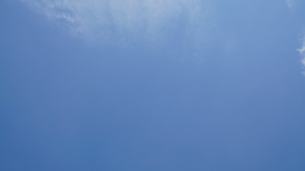 White cloud and blue sky background with copy space