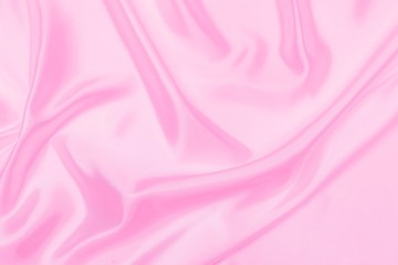 Plastic pink satin fabric texture soft blur background