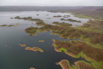 Aerial landscape view of Lake Argyle, the largest man made lake in Australia in the remote Kimberley region of Australia.