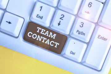 Text sign showing Team Contact. Business photo showcasing The interaction of the individuals on a...