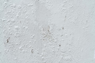Old gray peeling paint wall