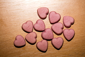 Pink hearts home made pills macro background fifty megapixels prints exstacy mdma First look at LSD...