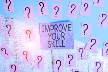 Text sign showing Improve Your Skill. Business photo showcasing Unlock Potentials from Very Good to Excellent to Mastery Scribbled and crumbling papers with thick cardboard above wooden table