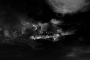 white cloud and black sky textured background