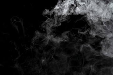 Abstract powder or smoke effect isolated on black background