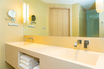 White sink with water faucet decoration in bathroom