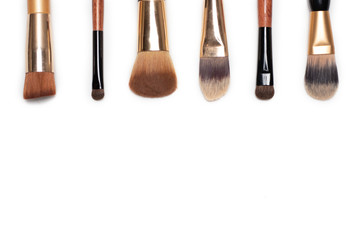 Set of make up brushes for face and eyes. Essential tools for applying make up product on face. Make up banner with copy and design space.
