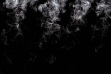 Abstract powder or smoke effect isolated on black background,Out of focus