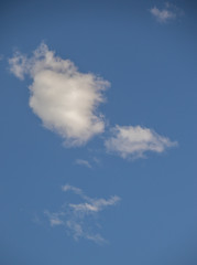 White clouds isolated on a blue sky image for background use with copy space