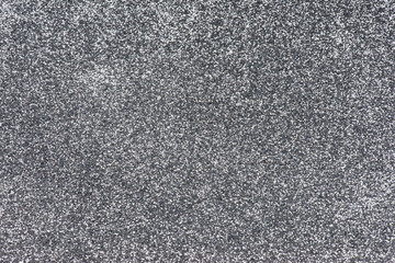Silver glitter for background. Macro