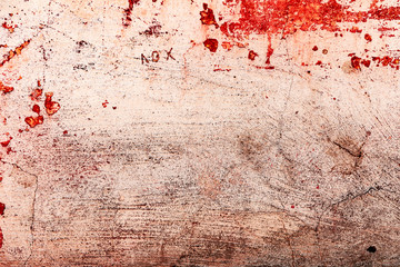 Texture of a concrete wall with cracks and scratches which can be used as a background