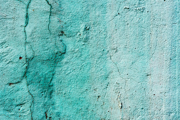 Texture of a concrete wall with cracks and scratches which can be used as a background